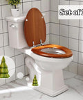 Set Of Two Green Christmas Tree Toilet Bolt Covers That Snaps Right On In Seconds And Brings Hella Cute Holiday Bathroom Decor To Any Home While Keeping Ugly Bolts Straight Outta Sight All Season Long on a white toilet with wooden seat.