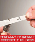 Close-up of hand using Tempered Steel Metric Thickness Gauge With Easily Removed Leaves for Woodworking and Home Improvement, 20 Leaves, 12.7 mm by 77 mm, Thickness Range 0.05 mm to 1.0 mm, Model 66MA, Carpenter Favorite Pro Gauge for Accurate Readings on a spark plug
