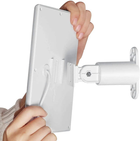 Person installing Wyze Cam Outdoor Solar Panel 3 Pack White, 2W 5V Charging Keeps Your Outdoor Surveillance Camera Going Nonstop