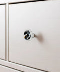 Premium 4 Pack 1.37 Inch Round Marble Cabinet Knobs With A Fresh Black And White Liquid ABS Cabochon Glass Finish on drawer