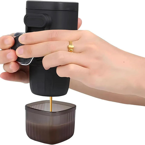 Person using the Smooth Operator Hand Pump Espresso Maker For Pods Or Grounds Portable Travel Coffee Brewer to brew coffee.