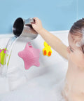 Kid Safe Silicone Bathtub Overflow Drain Cover With Five Rock Solid Suction Cups shown in use with a child during bath time.