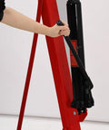 Person operating lever on 2 Ton Cherry Picker Engine Hoist Heavy Duty Folding Hydraulic Crane With 6 Casters And Lever For Auto Repair Garage.
