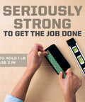 Hands using Indoor Double Sided Mounting Tape 1/2 Inch By 80 Inch With Industrial Strength Adhesive For Painted Surfaces Holds Up To 15 Pounds On Contact