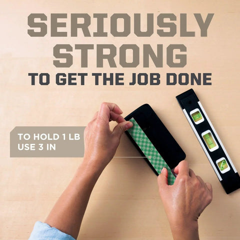 Hands using Indoor Double Sided Mounting Tape 1/2 Inch By 80 Inch With Industrial Strength Adhesive For Painted Surfaces Holds Up To 15 Pounds On Contact