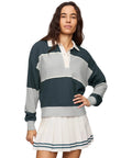 Women's Study Break Polo Sweatshirt In Feather Gray, 100 Percent Cotton With Yarn Dyed Stripe, Collared Polo Neck, Long Sleeves, Cozy Yet Polished Layer For Everyday Comfort And Effortless Style. Model wearing feather gray striped cotton polo sweatshirt