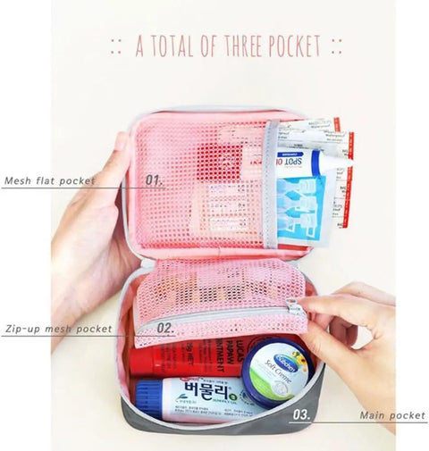 Open Pink Mini Outdoor First Aid Kit Bag for Travel and Everyday Use, showing handy pockets with medical supplies inside.