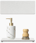 Two Pack Beige Diatomite Soap Dryers Rapid Absorbing Countertop Organizers flat dish with soap dispenser and brush.