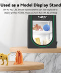 Two Tier Filament Storage Rack With Cloth Cover For 3D Printers displayed with 3D printed models inside, black