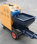 Portable Cement Mortar Spraying Machine For Professional Wall Plastering Stucco Render Equipment on wheels for easy transport.