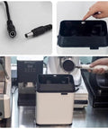 Plug And Play Electric Coffee Filter Cleaner Knock Box With Dual Scrapers And Brush For Home Or Cafe Use White model with power cord and filter holder.