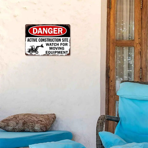 Active Construction Site Warning Sign Aluminum 8x12 Inch Rustproof Metal Wall Decor on white wall near patio chair.