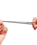 Hand stretching a rubber bow string silencer for 4 Pack Bow String Silencers Dampeners For Recurve And Compound Bows, Noise Reduction