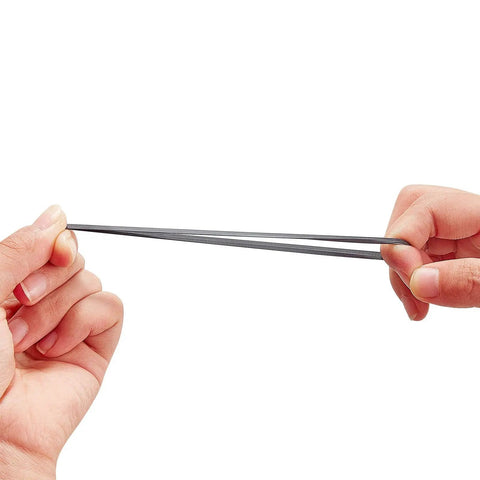 Hand stretching a rubber bow string silencer for 4 Pack Bow String Silencers Dampeners For Recurve And Compound Bows, Noise Reduction