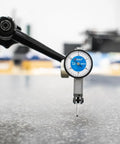 Large Face Dial Test Indicator for Precision Machining with 0 to.030 Inch Range and.0005 Inch Graduation on metal surface