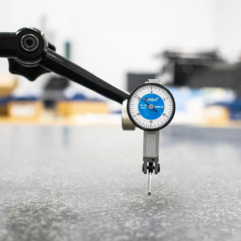 Large Face Dial Test Indicator for Precision Machining with 0 to.030 Inch Range and.0005 Inch Graduation on metal surface