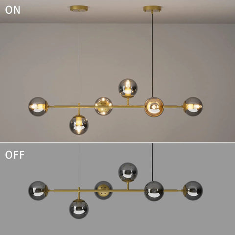 Modern Gold Pendant Lighting With Smoke Gray Glass Globes Adjustable 6-Light Hanging Ceiling Fixture For Living Room Dining Room Kitchen And Bedroom With A Soft Glow For A Cozy Vibe shown on and off.
