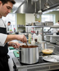 Chef using an 8 Qt Aluminum Double Boiler Pot With Cover For Chocolate Melting Fondue Candy Cheese Desserts in a professional kitchen