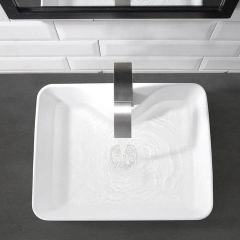 Top view of White Rectangle Ceramic Vessel Sink Combo With Stainless Steel Faucet And Chrome Pop Up Drain For Modern Vanity Dope Sleek 19x15 Inch Porcelain Art Basin Premium Glazed Ceramic Bathroom Sink with water flowing.