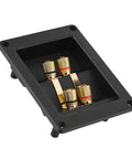 Heavy Duty Audio Terminal Strip With Binding Posts For Secure Wire Hooks And Four Hole Mounts That Square Away Custom Speaker Cabinets And Kick Up Your Setup, featuring four gold binding posts in a black panel.