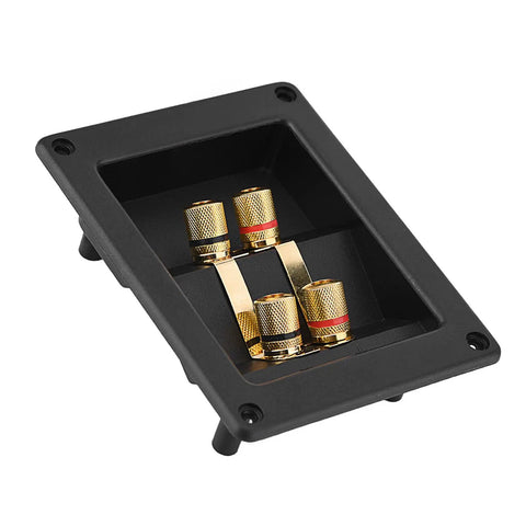 Heavy Duty Audio Terminal Strip With Binding Posts For Secure Wire Hooks And Four Hole Mounts That Square Away Custom Speaker Cabinets And Kick Up Your Setup, featuring four gold binding posts in a black panel.