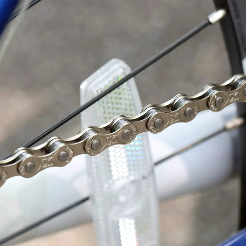 Five To Eight Speed Bike Chain One Half By Three Thirty Second Inch 122 Links, Easy To Install Quick Link Master Link close-up on bike
