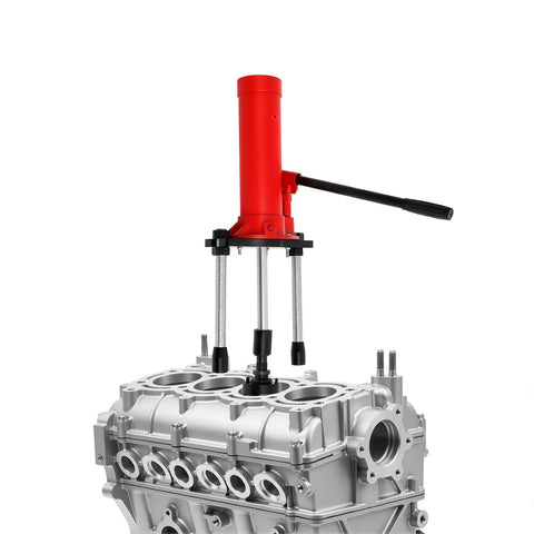 Badass 15 Ton Hydraulic Cylinder Liner Puller Kit For Universal Wet Dry Engine Sleeve Ripper extracting from a silver engine block.