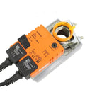 Rock Solid 24V Damper Actuator With Built Tough Feedback Potentiometer For Smooth Hvac Airflow Management 10Nm Rotary Torque Open Close Bidirectional Control Nm24Ap5 Ce Approved Workhorse Grade close-up of orange actuator with connection cables