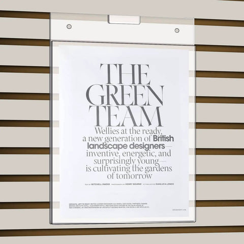 Three Pack 8.5x11 Clear Slat Wall Sign Holders For Menus And Flyers displaying flyer on slat wall