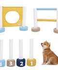Indoor Dog Agility Training Kit 3 In 1 With Jump Ring, Double Bar Hurdle, and Pole Fence for small dogs next to a puppy.