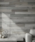 Heritage Gray Reactive Water Based VOC Free Interior Wood Stain 55 Gallon Tank on weathered wood wall with soft gray tones.