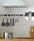 FINDMAG 40x20mm neodymium magnet disc mounted on a stainless steel kitchen rail with utensils
