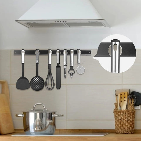 FINDMAG 40x20mm neodymium magnet disc mounted on a stainless steel kitchen rail with utensils