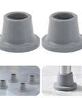 Grippy Anti Slip Rubber Feet for Shower Chairs, light grey, 4 pack, on wet bathroom floor providing enhanced stability and safe grip.