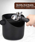 Hand using portafilter to knock grounds into Knock Box For Coffee Grounds 4.4 Inch With Removable Knock Bar And Non Slip Base