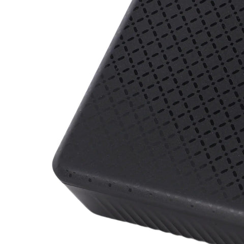 Close-up of Mini UPS 15600mAh Battery Backup for Router and Modem USA Plug showing textured surface design.