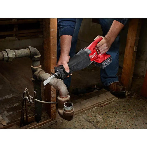 Person using Heavy Duty Reciprocating Saw Blade Set, 12 Piece, Thick.042 and.062 Inch Blades, 1 Inch Height on metal pipe