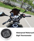 Motorcycle thermometer mounted on the handlebar; front view shows waterproof digital gauge and mirrors
