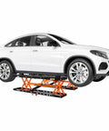 Heavy Duty 5000 Lb Portable Car Lift With Rock Solid Q355B Steel Scissor Jack elevating a white SUV for maintenance.