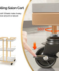 Close-up of Wheeled Beauty Salon Cart on Gold Finish showing 360-degree rotating wheels and adjustable shelves for mobile spa use.