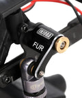 Close-up of CNC Aluminum Shock Flex Blades For SCX24 1 24 RC Crawler Upgrade on shock arm mount.