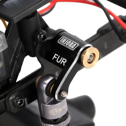 Close-up of CNC Aluminum Shock Flex Blades For SCX24 1 24 RC Crawler Upgrade on shock arm mount.