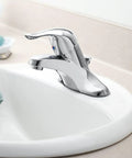 Low Arc One Handle Chrome Bathroom Faucet With Aerated Flow And No Fuss Single Lever Control for grooming in countertop view