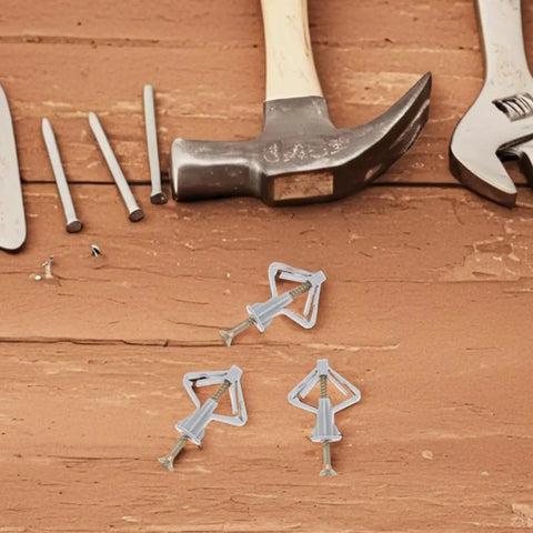 Heavy Duty Drywall Anchors And Screws Kit With Plastic Butterfly Hooks, 50 sets for hollow walls shown with tools on wood surface