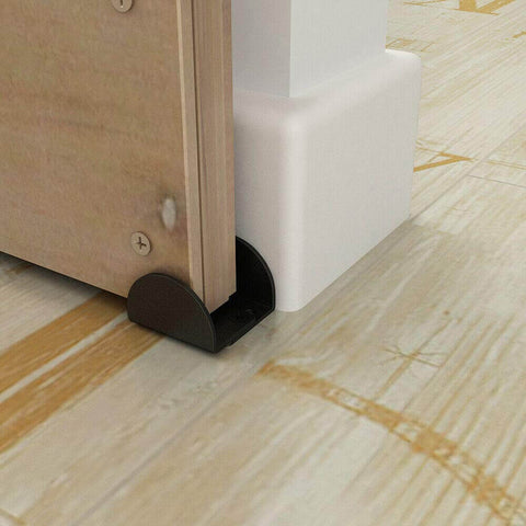 Sliding Barn Door Floor Guide U Shape Bottom Guide in durable matte black floor mounted shown in use with door for home kitchen bedroom office