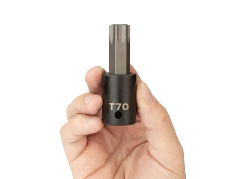 Person holding Half Inch Drive T70 Torx Impact Bit Socket With S2 Steel Six Lobed Torx Tip, precision tolerance fit, high torque capacity