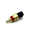 Engine coolant temperature sensor, side view; brass body, red seal, and black plastic connector.