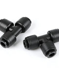 Close-up of black plastic connectors from Thirty Piece Quick Connect Drip Irrigation Tee Fittings Kit for One Quarter Inch Tubing