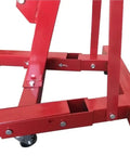 Close-up of the frame and wheels of the Top Shelf Folding Hydraulic Engine Hoist With Telescopic Boom 2 Ton Capacity Motor Crane.