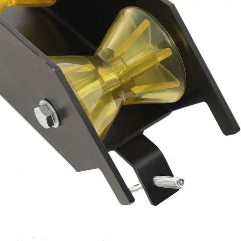 Close-up of yellow guide roller on slick hand crank water well pump puller, showcasing robust metal construction and installation detail.